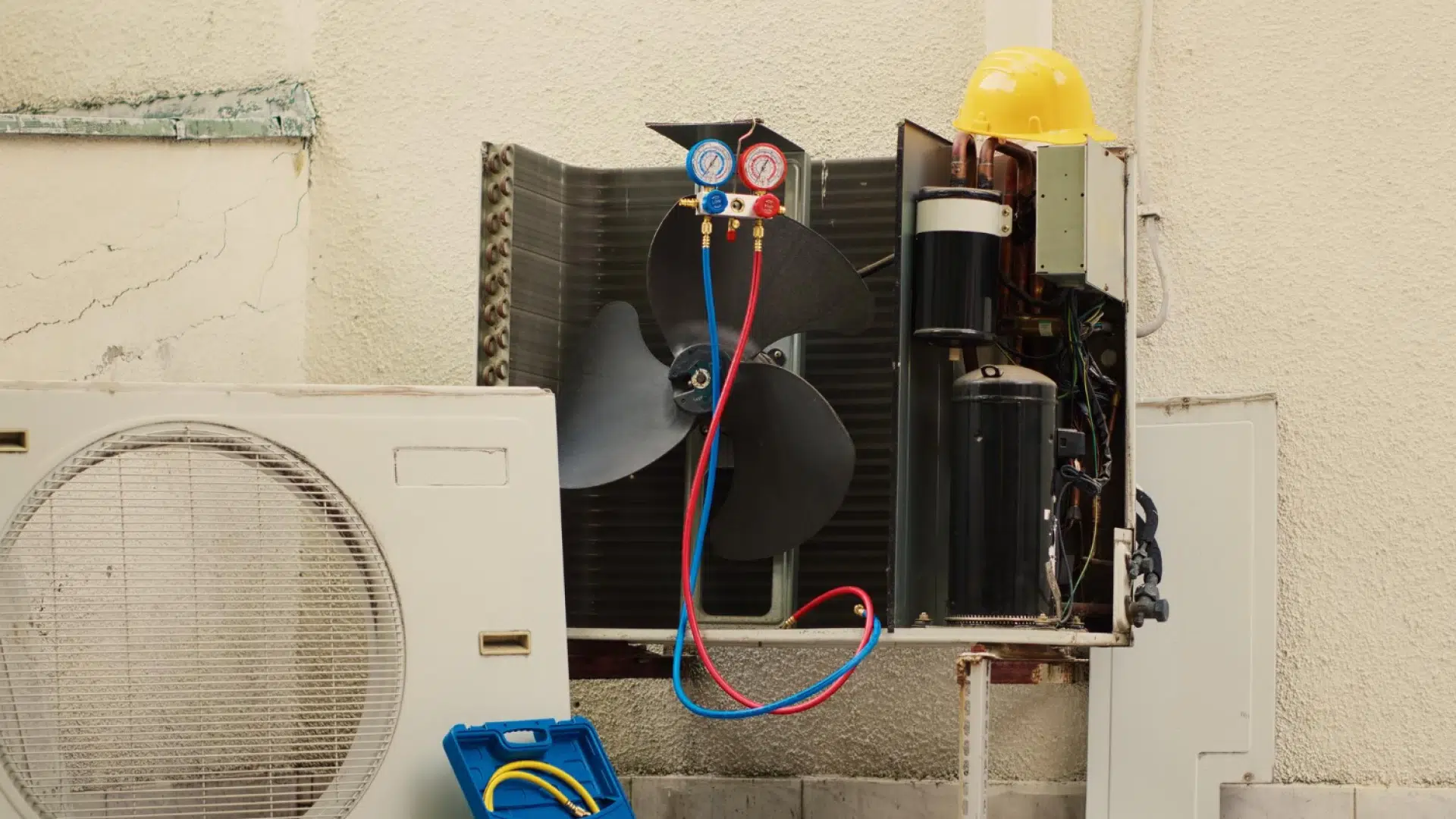 Opened AC unit with tools